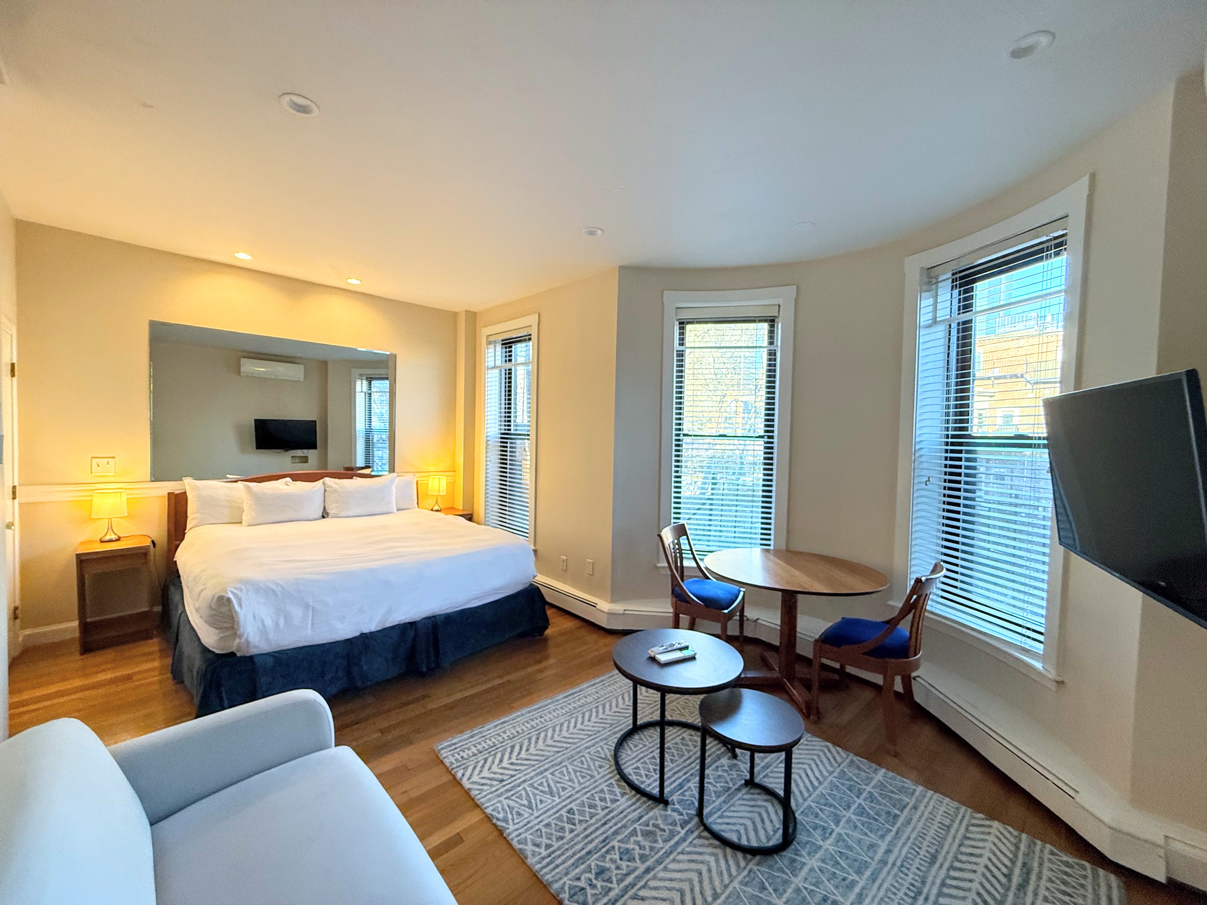 Bed, couch, table in room