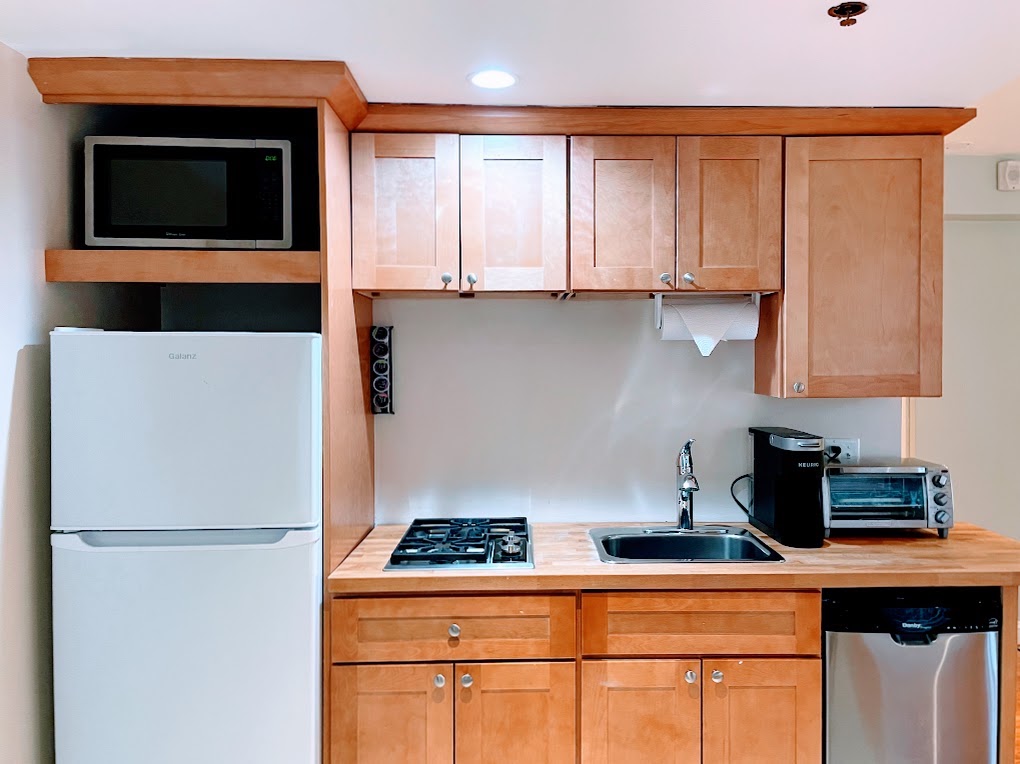 Kitchen cupboards and fridge