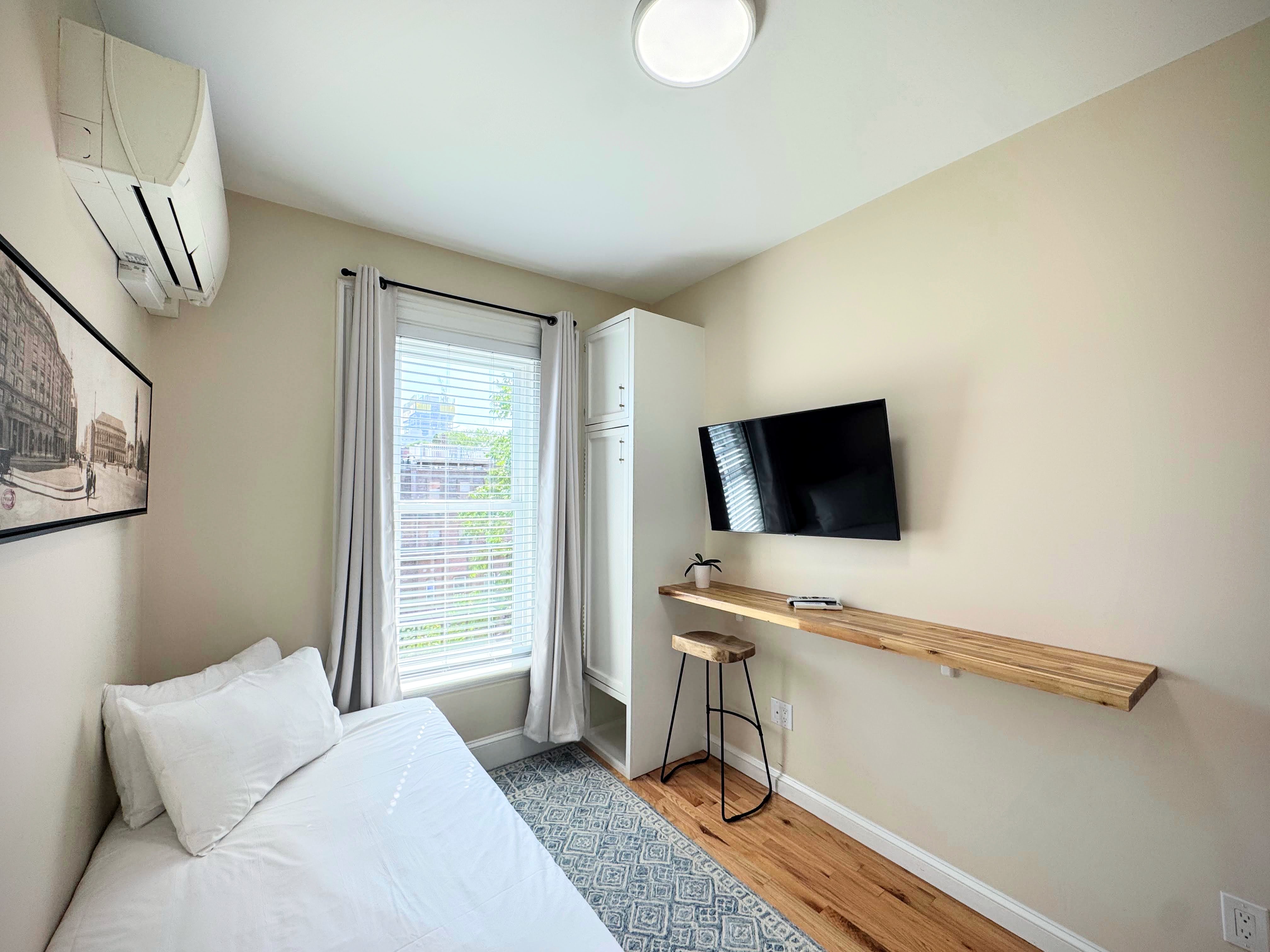 Twin bed with flat screen TV